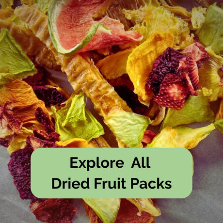 Selection of Australian dried fruit pieces including mango, watermelon, strawberry, and banana — representing individual fruit pack options