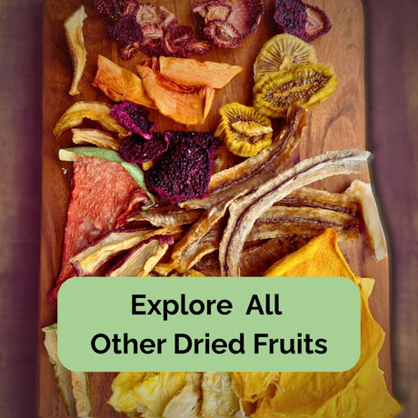 Assorted Australian dried fruits on a wooden board — featuring mango, kiwi, banana, dragon fruit, melon, and more in a vibrant, tropical mix