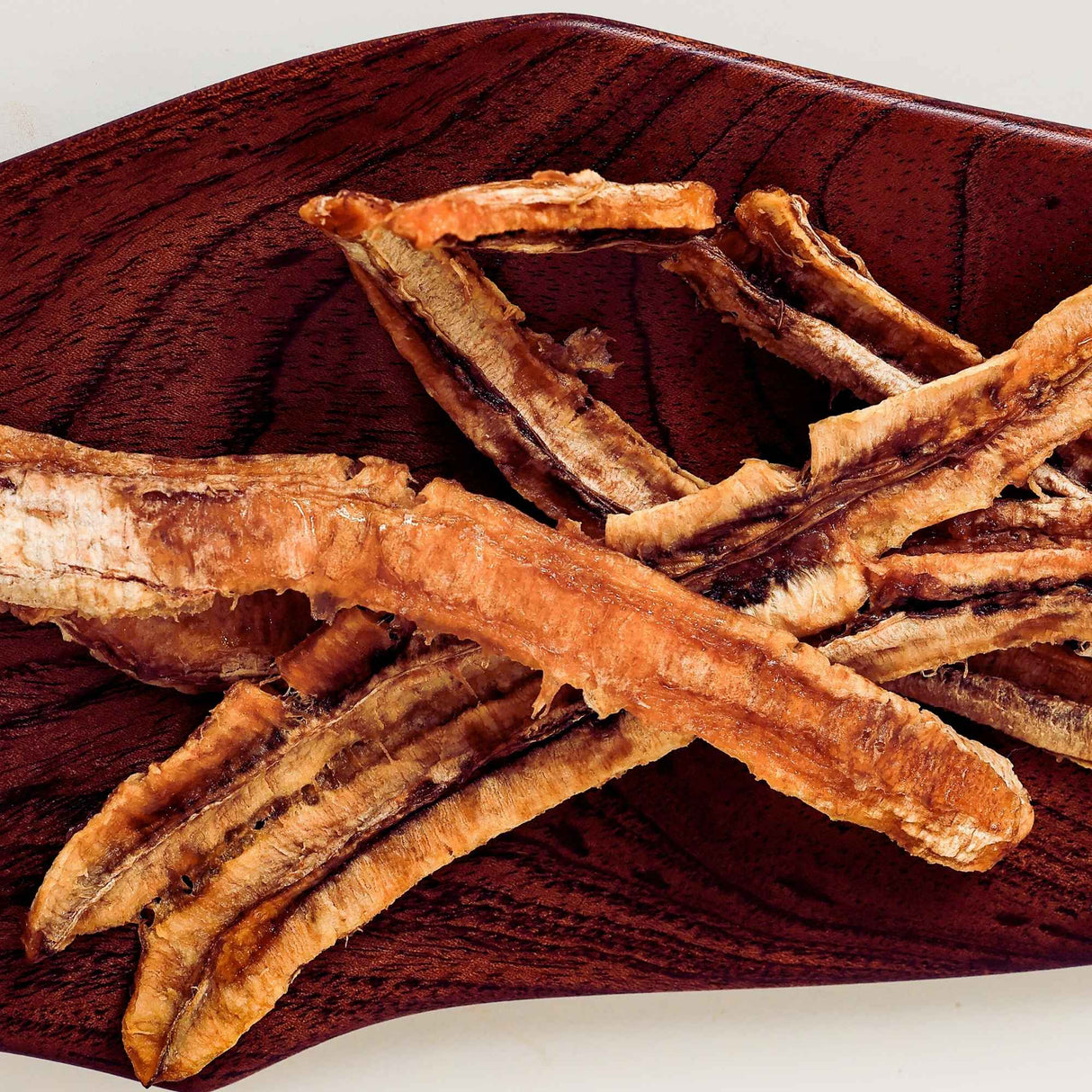 Australian dried banana long pieces sliced lengthwise showing natural chewy texture