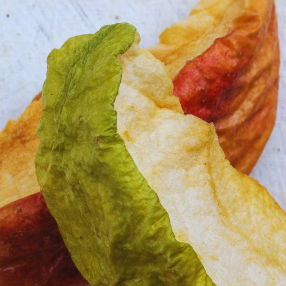 Close-up of dried apple slices showing natural texture and dehydrated fruit quality