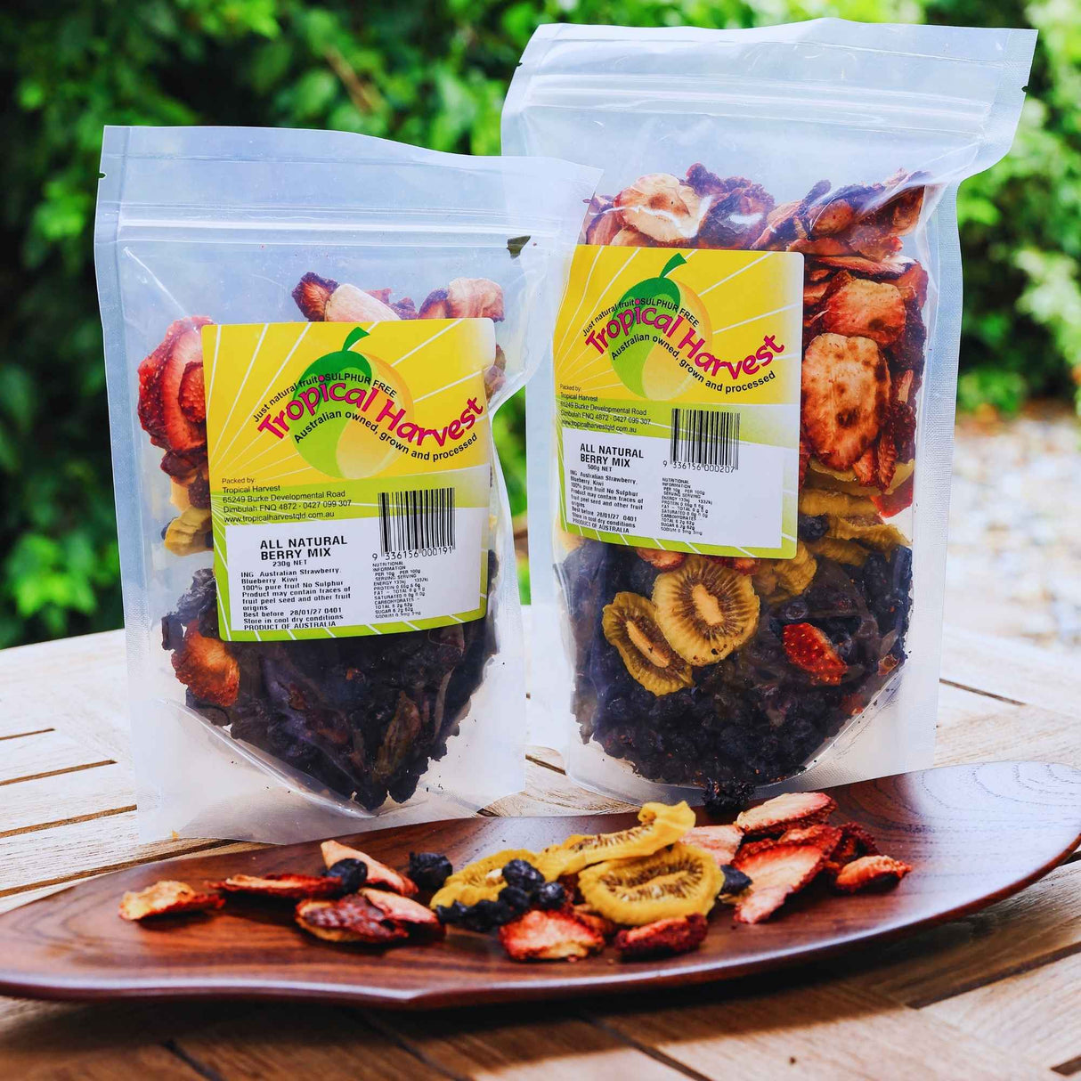 Dried fruit mix in 230g and 500g packs displayed outdoors showing natural snack product