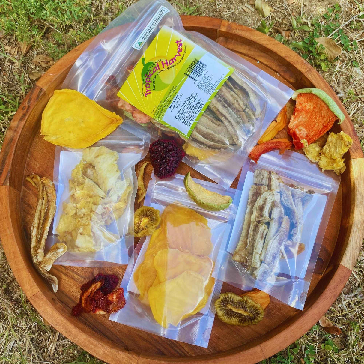 Top view dried fruit sample pack platter with mixed dried fruit including mango pineapple banana and fruit mix