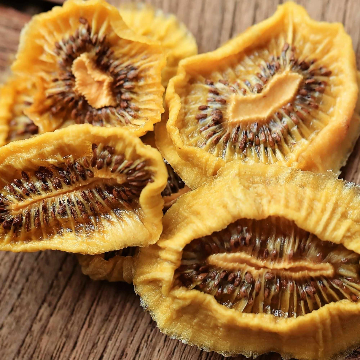 Close up dried kiwi slices showing texture and natural fruit detail