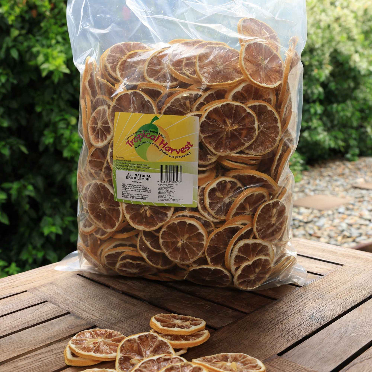 1kg bag of dried lemon slices displayed outdoors showing large quantity and natural product