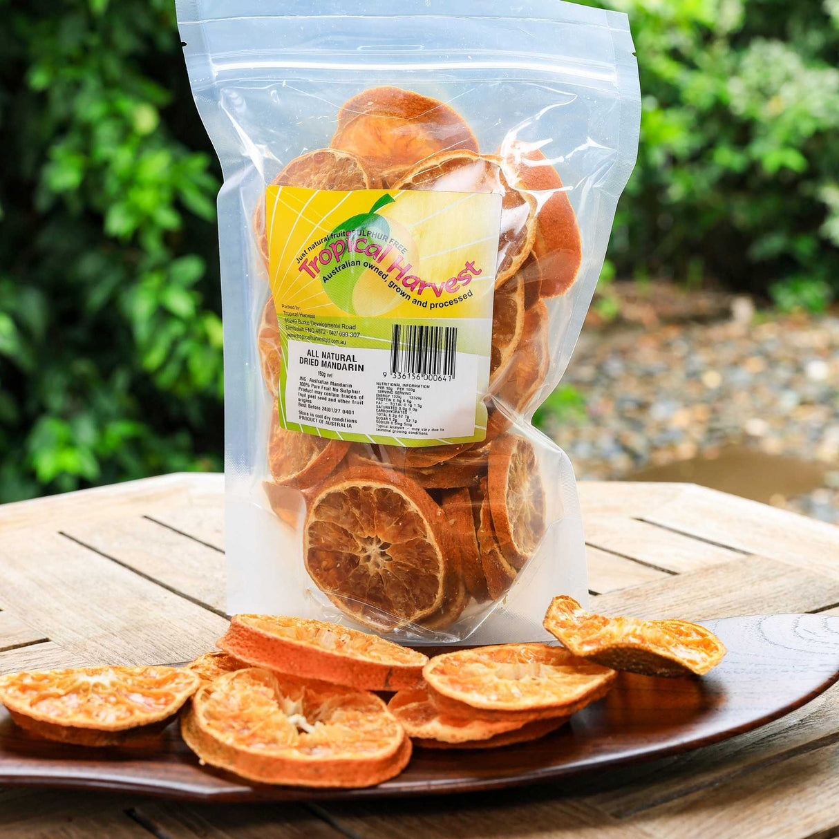150g pack of dried mandarin slices displayed on tray showing natural product quality