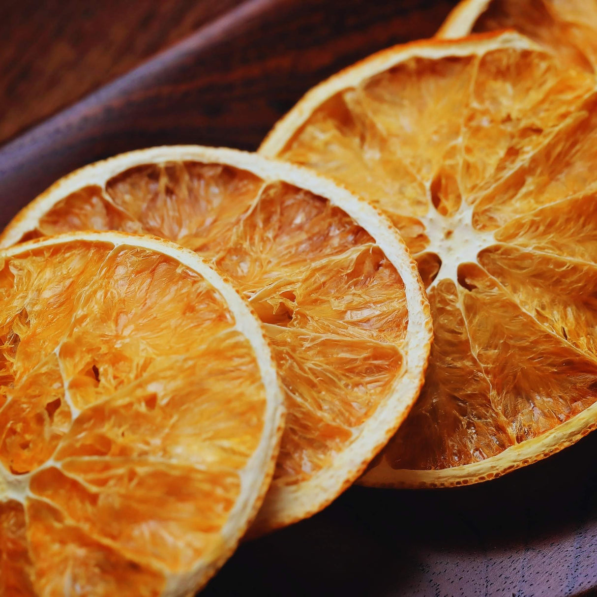 Close-up of dried orange slices showing natural citrus texture and vibrant color