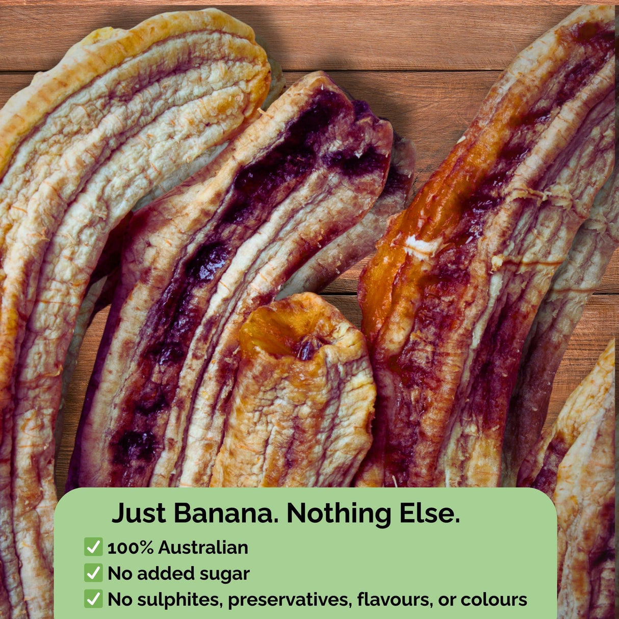 Whole dried bananas with text overlay: "Just Banana. Nothing Else. 100% Australian, no added sugar, no sulphites."