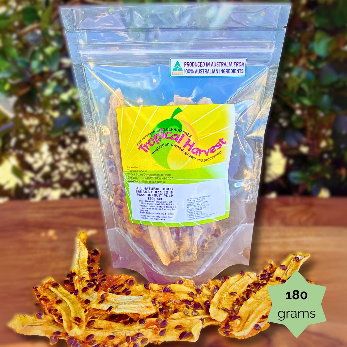 180g Tropical Harvest dried banana passionfruit pulp resealable pouch with tangy banana strips displayed. Perfect for lunchboxes or gifting.