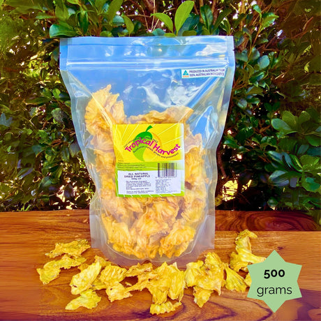 500g Tropical Harvest dried pineapple bag with visible chunks. Australian made, perfect for families or food prep.