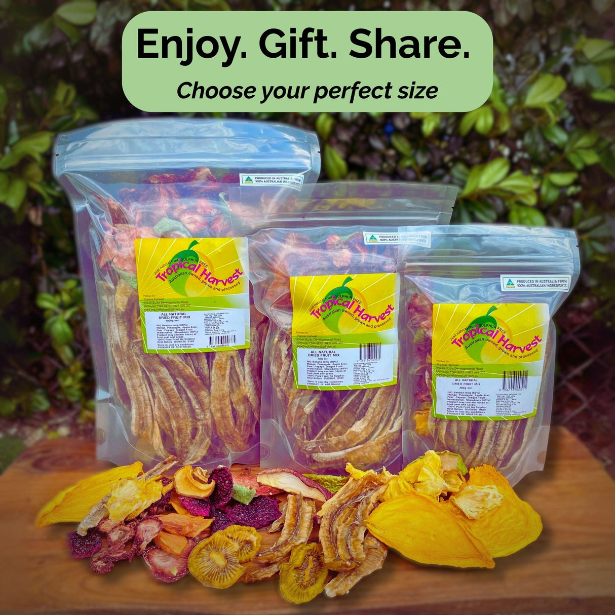 Range of Tropical Harvest dried fruit mix pouches (200g to 1kg) side by side, showing variety and packaging.