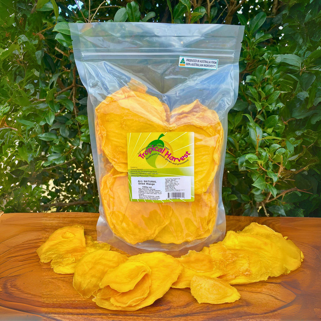 1Kg pack of premium dried mango cheek slices made from 100% Australian mangoes, displayed with loose slices in front of resealable bag