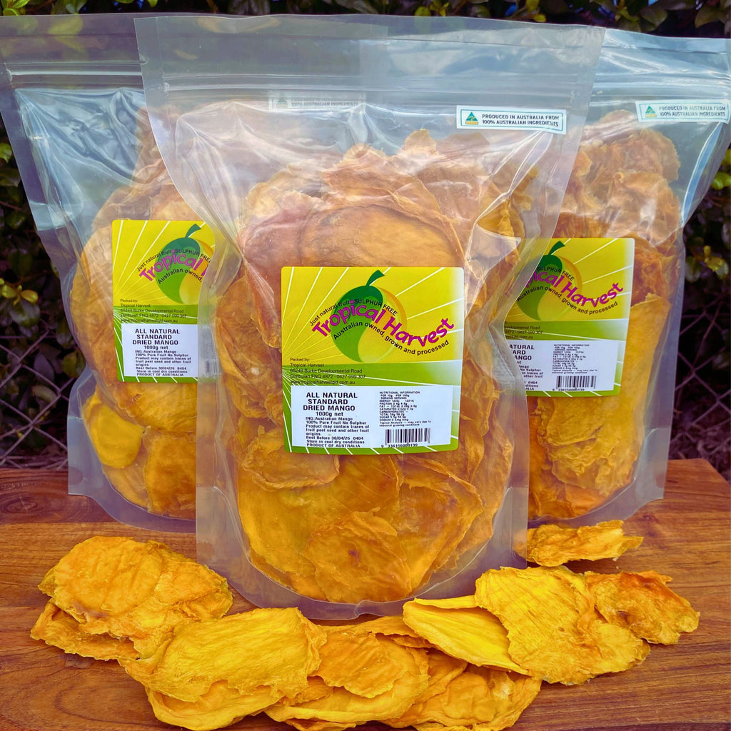 1Kg pack of standard dried mango slices made from 100% Australian mangoes, displayed with loose slices in front of resealable bag

