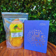 Blue sunflower 2026 diary and premium dried mango gift pack displayed together outdoors