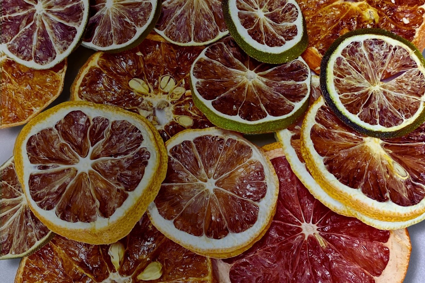  Close-up of 100% Australian dried citrus slices including lemon, lime, orange, and blood orange — vibrant and naturally preserved.