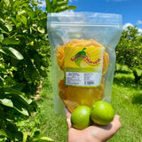 Australian dried mango lime product bag held in lime orchard on farm