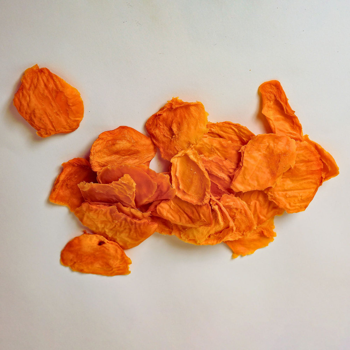 Australian dried mango minis showing naturally smaller slices made from 100% Australian mango.