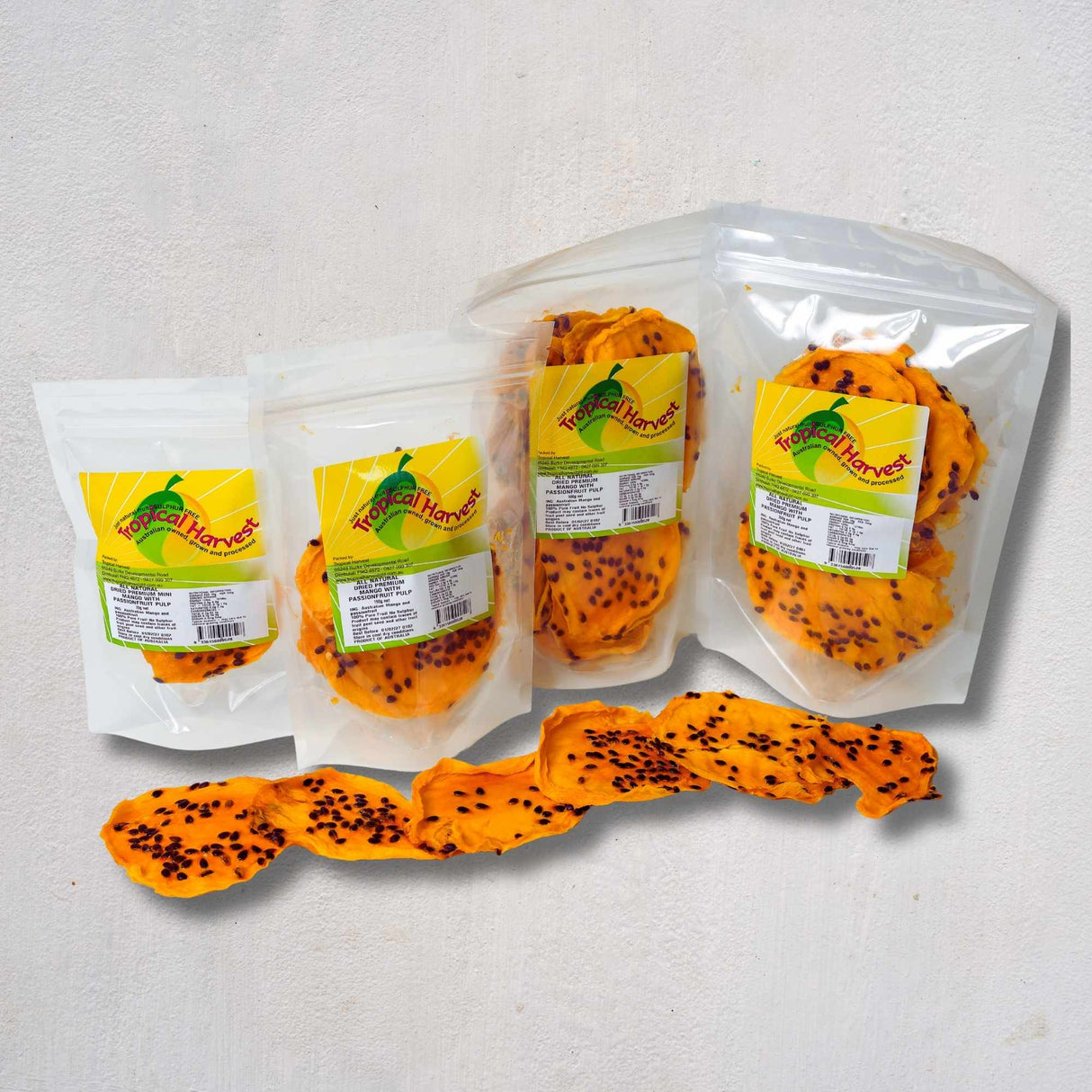 Australian dried mango with passionfruit pulp available in 70g, 150g, 350g and 500g sizes, dried and packed in North Queensland.