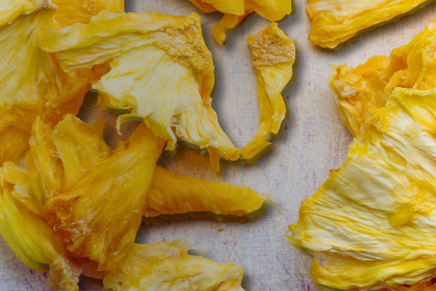 Close-up of pure Australian dried pineapple slices – naturally sweet, golden, and sulphur-free.