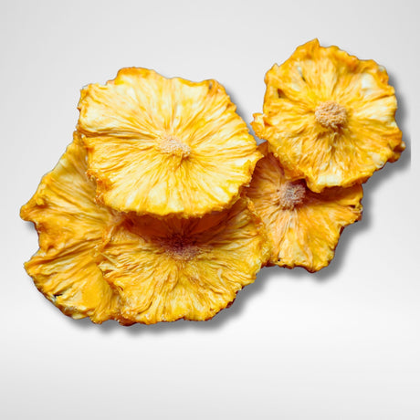 Australian dried pineapple flowers showing natural round pineapple slices slowly dried to create flower shapes