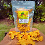 Bag of Australian Kensington Pride dried mango strips displayed outdoors with mango strips in front
