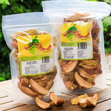 Dried apple slices in 150g and 350g packs displayed outdoors showing natural product quality