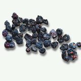 Dried blueberries on white background for healthy snacking and natural fruit snack