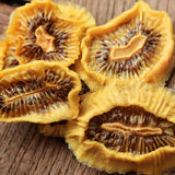 Close up dried kiwi slices showing texture and natural fruit detail