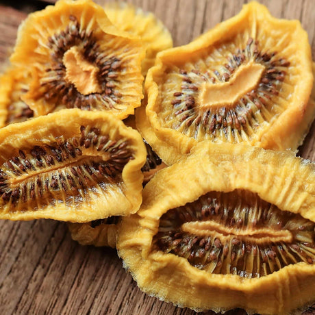 Close up dried kiwi slices showing texture and natural fruit detail