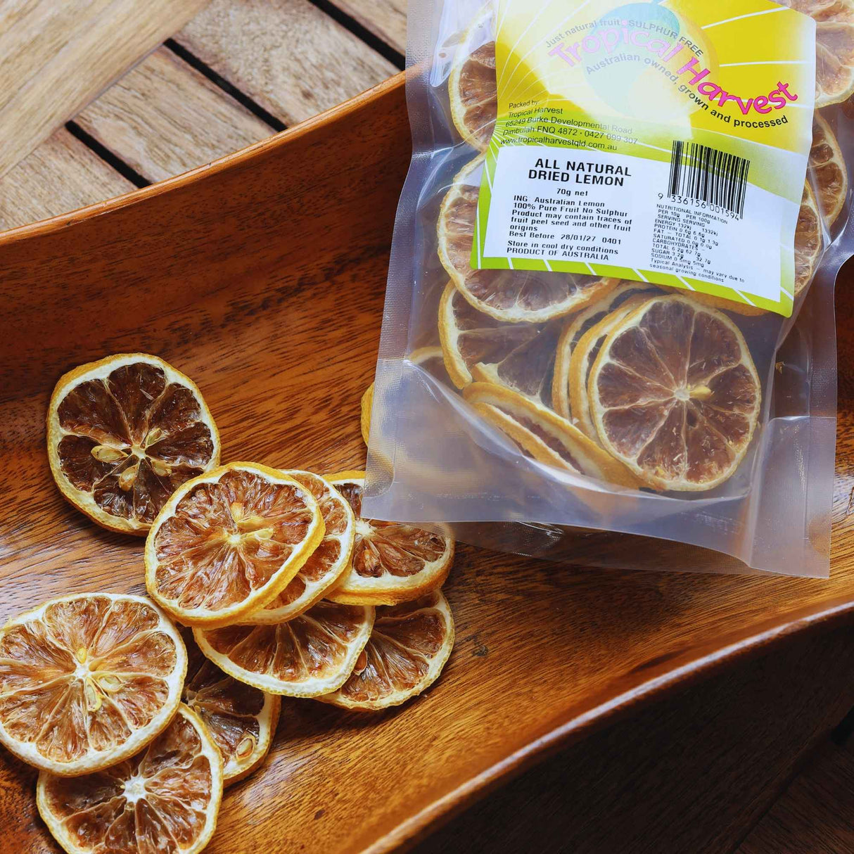 Dried lemon slices from 70g pack poured onto tray showing natural texture and quality