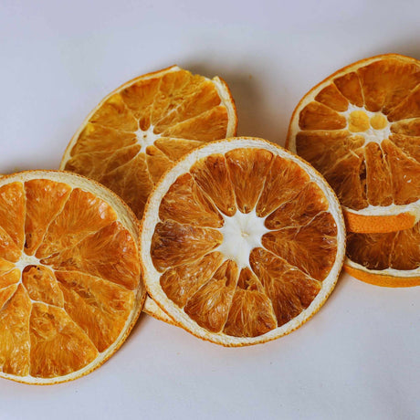 Dried orange slices on white background for cocktails drink garnish and baking