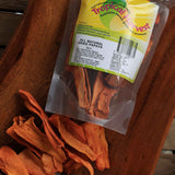 Packaged dried papaya with loose fruit pieces showing quality dried fruit snack Australia