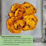 Detailed view of dried passionfruit mango slices on parchment-lined tray, showing glossy dried mango flesh with visible passionfruit seeds. Text overlay reads: ‘Sweet mango infused with real passionfruit pulp & seeds — bold flavour, tropical crunch. 100% Australian. No added sugar or sulphur. Limited run each season.