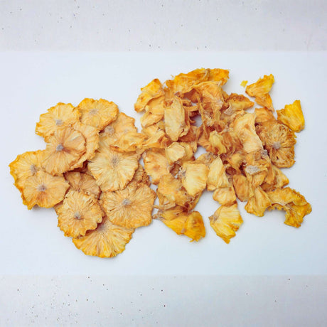 Comparison of dried pineapple flowers and dried pineapple pieces showing the difference in shape and cut