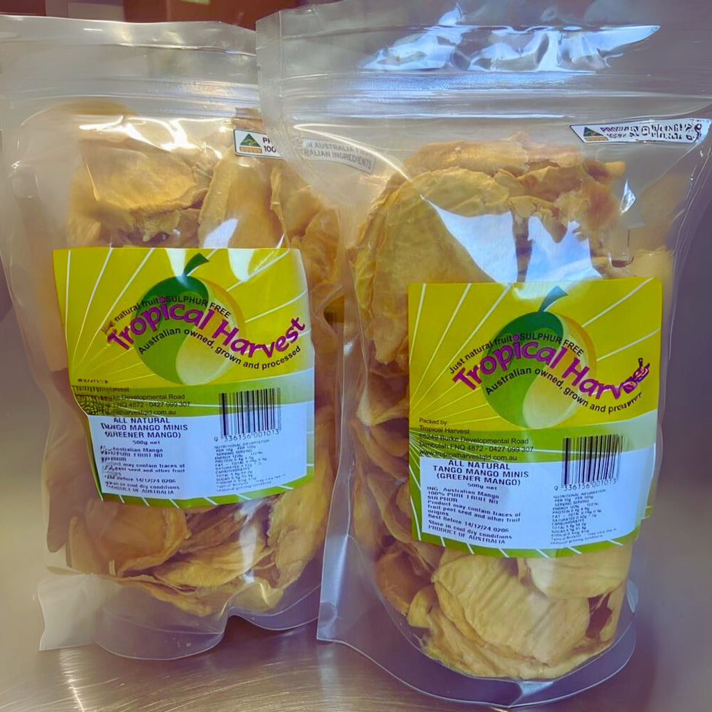 500g pack of Green Dried Mango Minis by Tropical Harvest in a clear resealable bag with a bright yellow label.