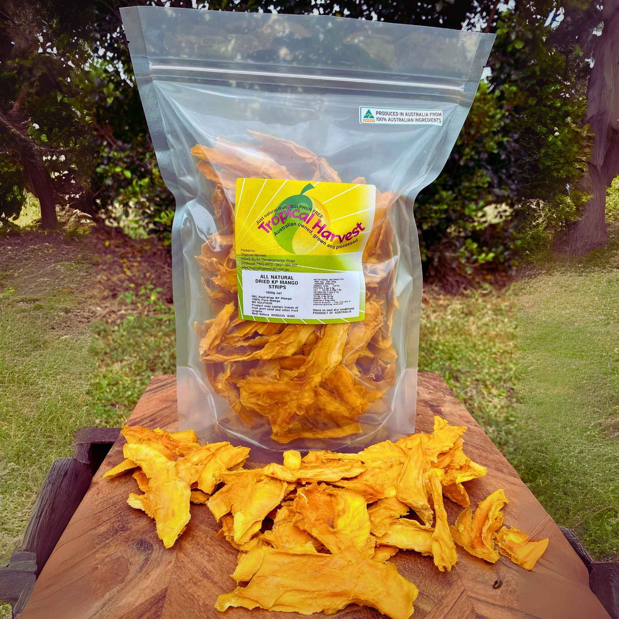Australian Kensington Pride dried mango strips in a resealable bag with chewy mango strips displayed in front