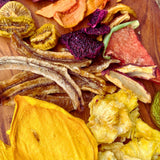 Top view of mixed dried fruit variety including mango banana pineapple strawberry and exotic fruits