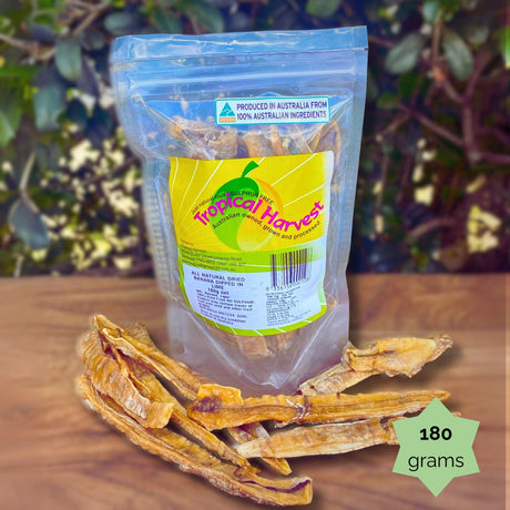180g Tropical Harvest dried banana lime resealable pouch with chewy banana slices displayed. Perfect for lunchboxes or on-the-go citrus snacking.