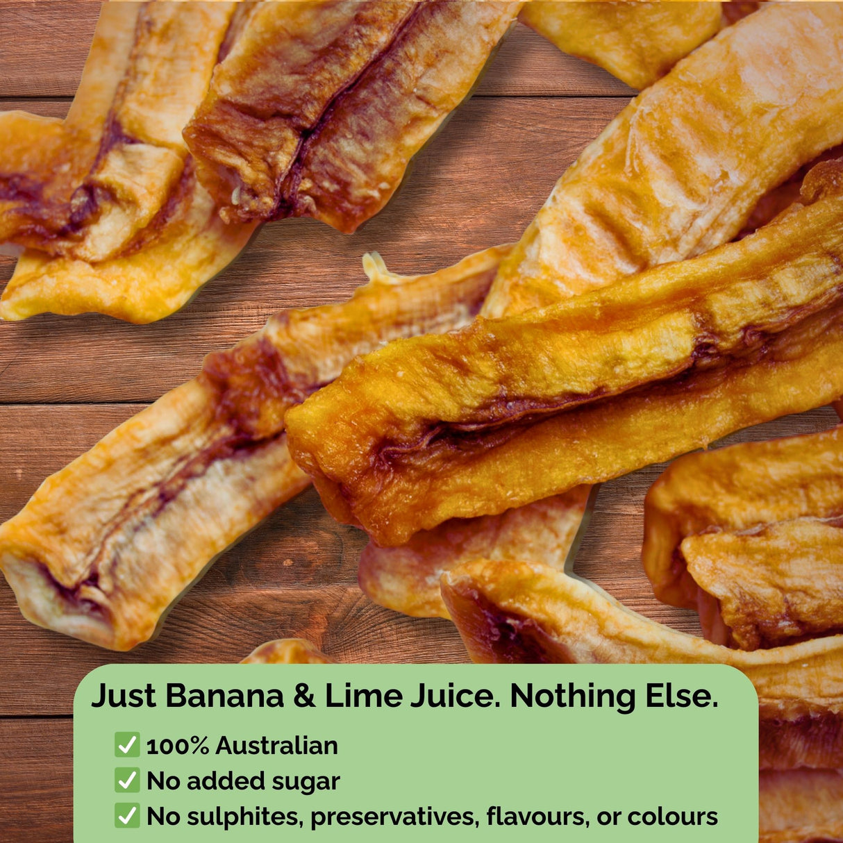 Dried banana lime slices on wooden background with text overlay: "Just Banana & Lime Juice. Nothing Else." No sugar, no sulphites, no preservatives