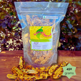 450g Tropical Harvest dried banana with passionfruit pulp resealable pack. Chewy banana strips with tangy passionfruit seeds are shown on a wooden background.