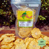 350g medium pack of Tropical Harvest dried pineapple flowers on wooden board. Australian-made, naturally sweet, no added sugar or sulphites.
