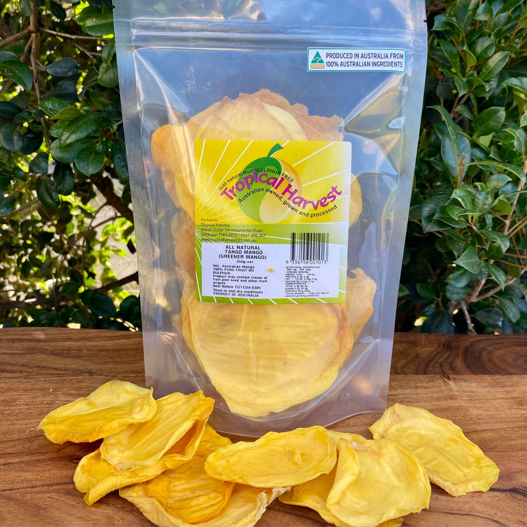 350g pack of Tropical Harvest Australian dried green mango with visible large slices and chewy texture, showing the pale colour unique to underripe mango.