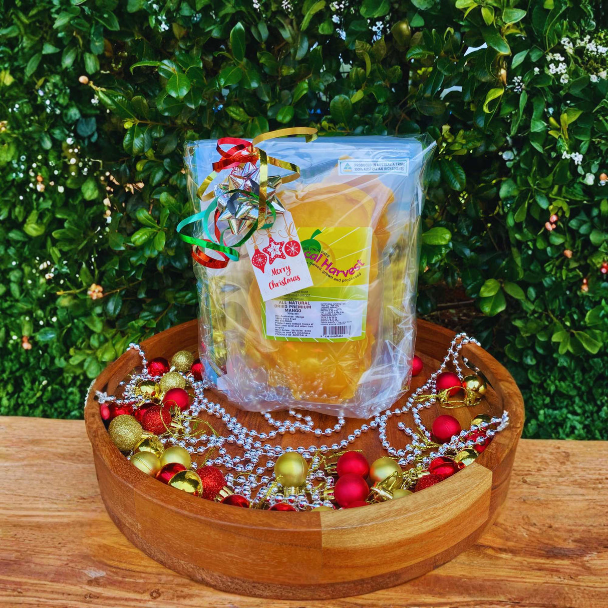 Wrapped dried mango and cookbook gift set with Christmas decorations – ready to gift summer foodie bundle